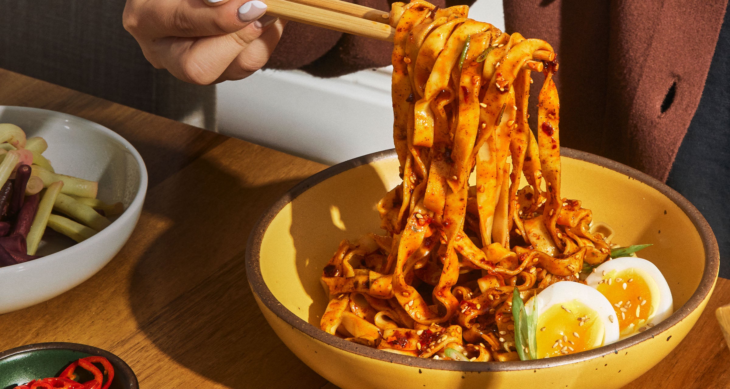 stir fried momofuku noodles with chili crunch and egg